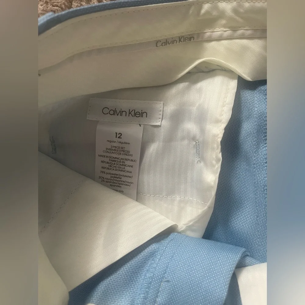 Calvin Klein 
Boys 3 piece suit 
NWT 
Size 10 jacket / size 12 vest and pants - Picture 6 of 6